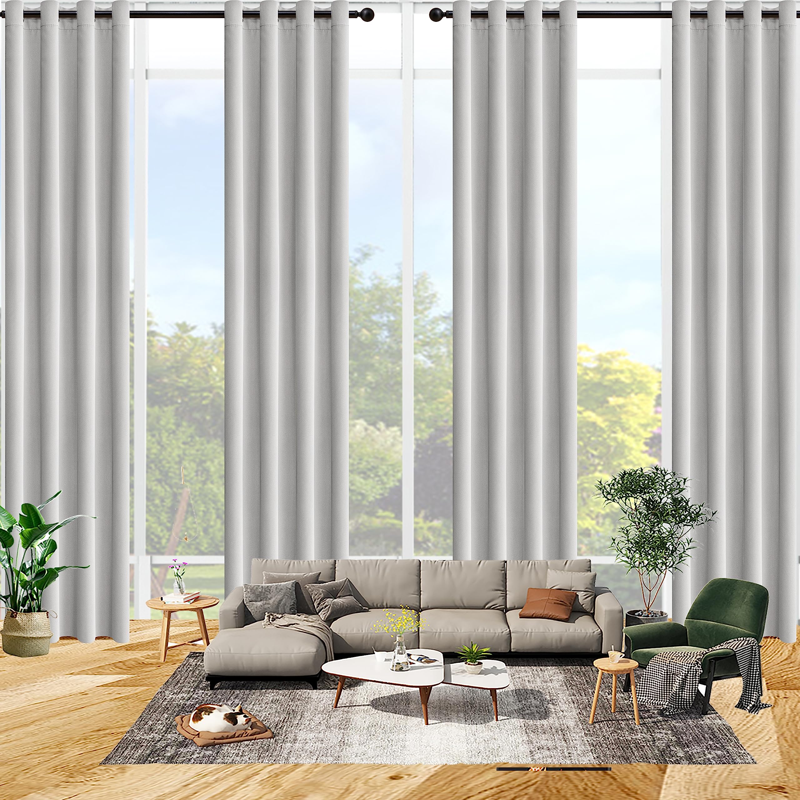 Window with curtains hung high and wide to make room feel taller