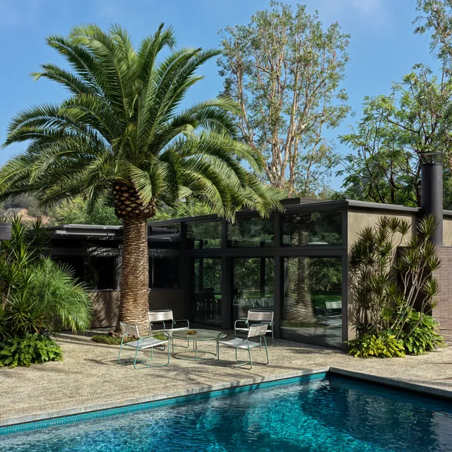Renovated guest house exterior with colorful, playful design details
