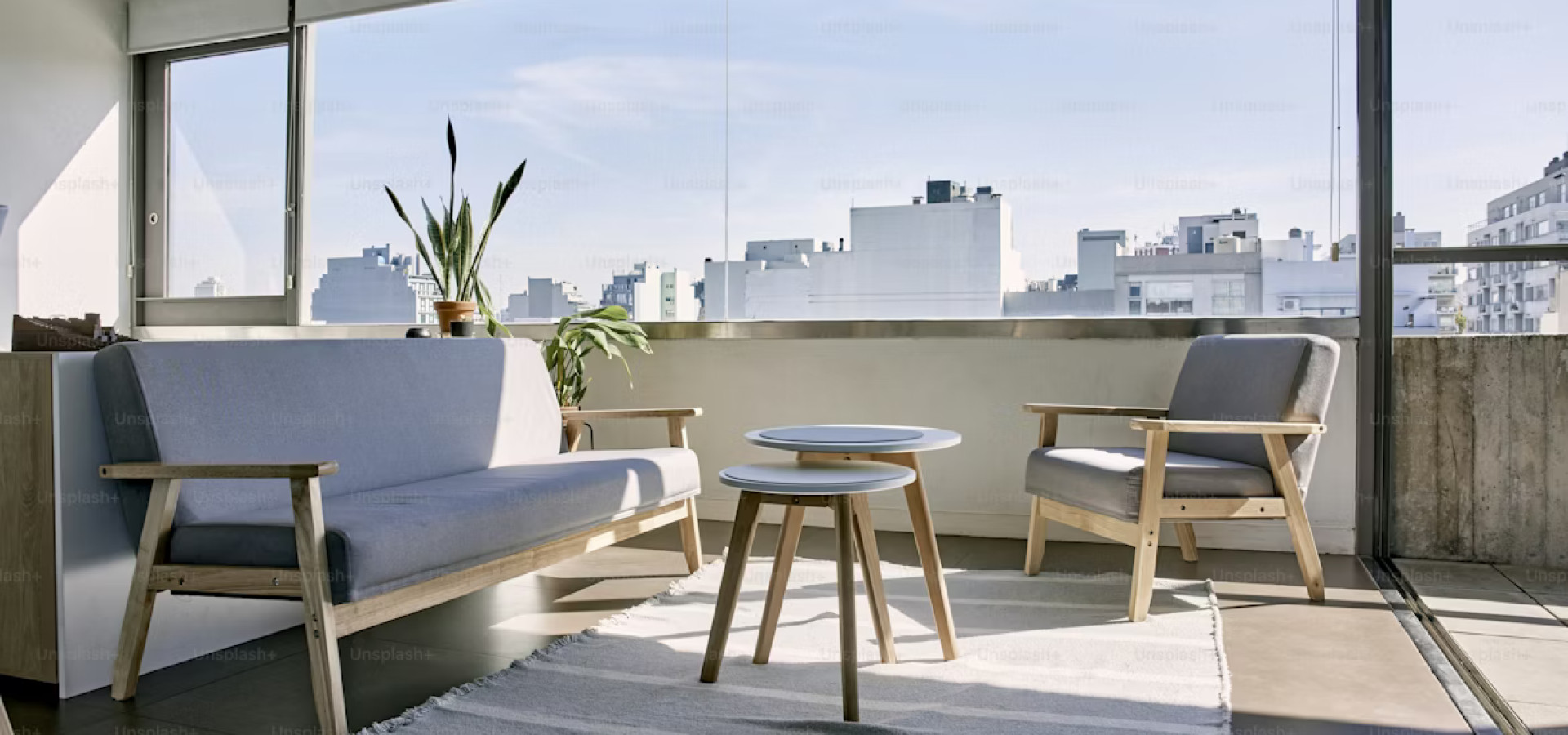 Modern Minimalist Balcony Living Space with Natural Light and Contemporary Interior Design